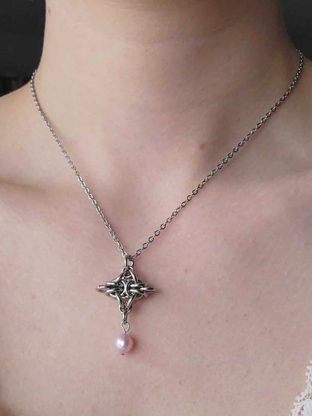 Vintage silver and pink pearl necklace with a small silver chain